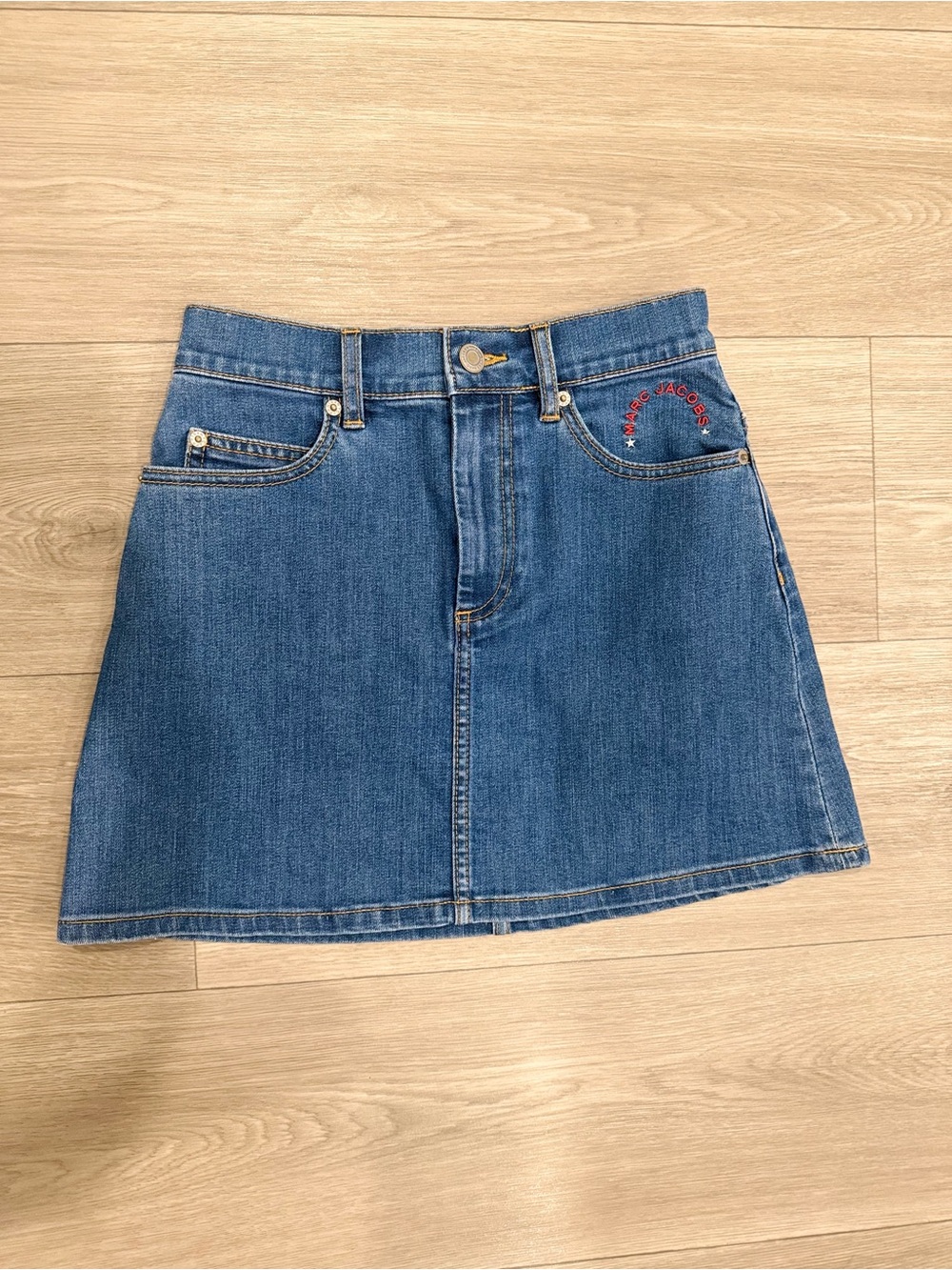 Marc Jacobs Medium Blue Denim Mini Skirt with Red Logo. Size 26. Like New.